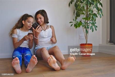 girl showing feet photos and premium high res pictures getty images