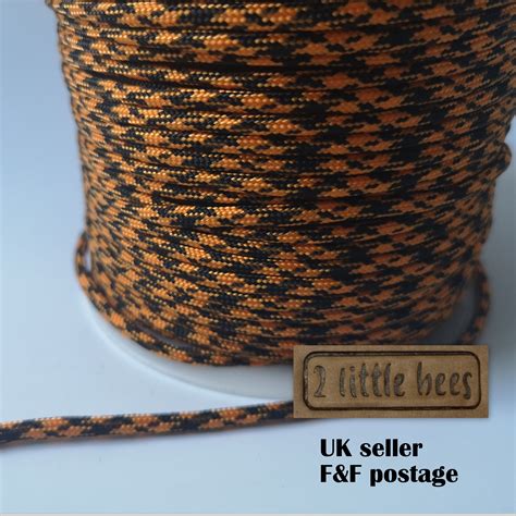 Bekijk meer ideeën over paracord, armband knopen, knopen. Strong paracord. Orange - black cord in 2020 | Paracord, Magnetic gift box, Paracord bracelets