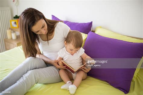Mom Please Read Me High Res Stock Photo Getty Images