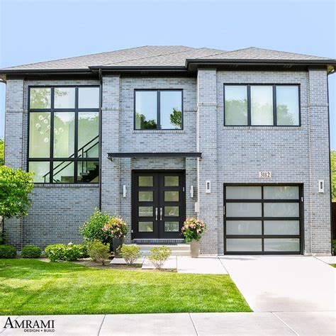 The Modern Flare Of This Custom Home Is Accentuated By The Blue Brick