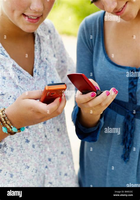 Two Phones Held Up Hi Res Stock Photography And Images Alamy