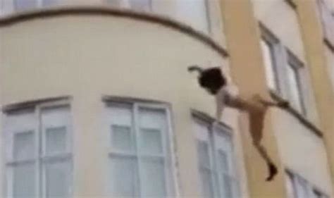 Woman Jumps From Third Floor Burning Building Window In Just Her