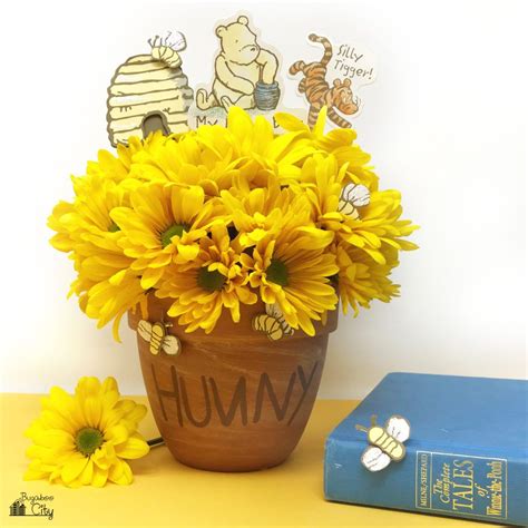 On the top, you can have a yellow pooh bear enjoying a pot of honey. Winnie the Pooh Honey Pot Centerpiece | Winnie the pooh ...