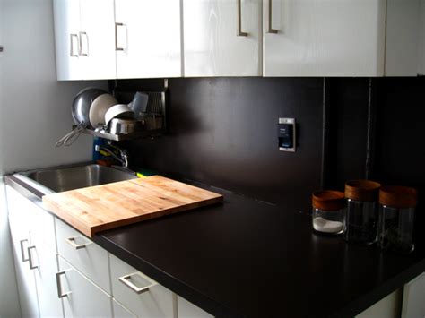 Especially in the kitchen, cabinets can harbor all sorts of greasy grime that will prevent even the best paint from sticking. Kitchen Laminate Countertop Repairs | How To Build A House
