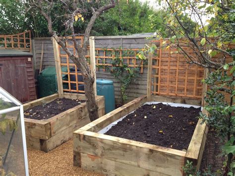 The quickcrop stepped vegetable planter is a very high quality 6ft by 4ft timber raised bed with a 21inch and a 14 inch high section for growing a wide variety of vegetable crops. Ross's raised vegetable beds with new pine railway sleepers
