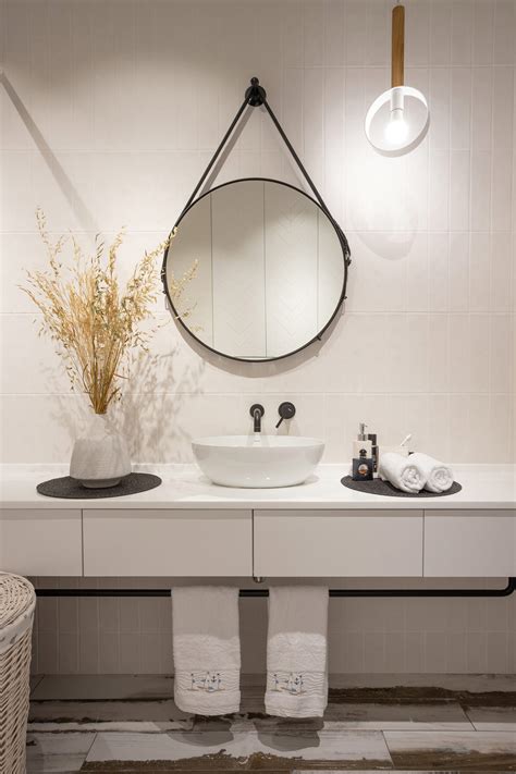 Typically, vanity mirrors are not wider than the vanity itself, with some exceptions we will discuss a little later. round-vanity-mirror - Awesome Decors