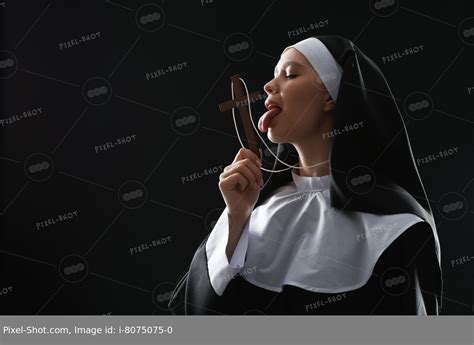 Slutty Nun With Cross On Dark Background Stock Photography Agency Pixel Shot Studio