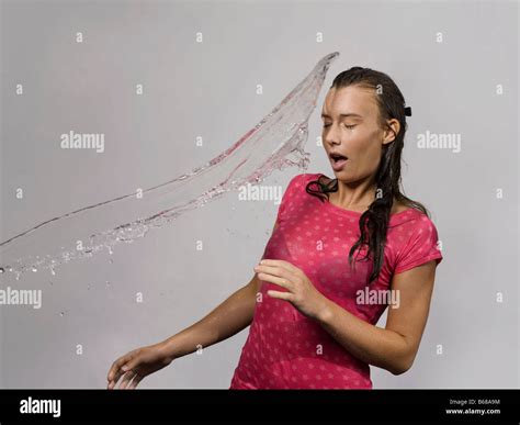 Woman Splashed With Water Stock Photo Alamy