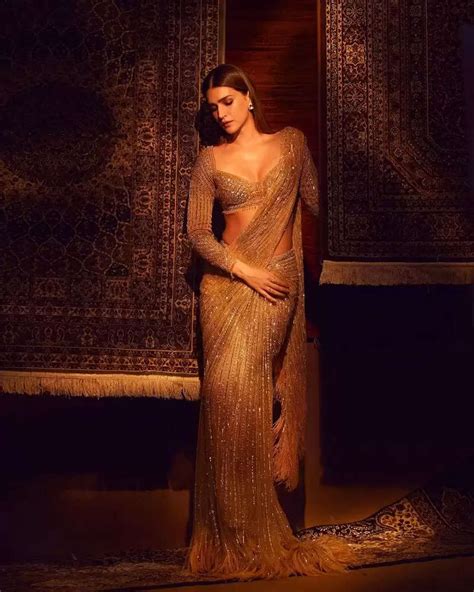 Photos Kriti Sanon Flaunts Her Beauty In Floral Saree See Her Beautiful Pics Here