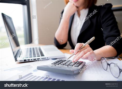 Asian Female Accountant Banker Making Calculations Stock Photo Shutterstock