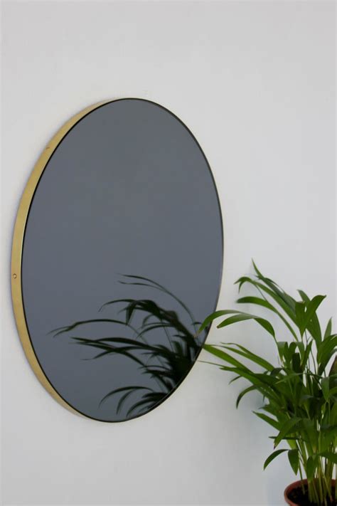Modernist Black Tinted Orbis™ Round Mirror With Brass Frame Medium