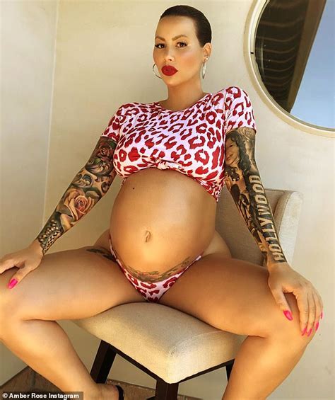 Amber Rose Lets Her Baby Bump Hang Out In Leopard Print Bikini And Crop