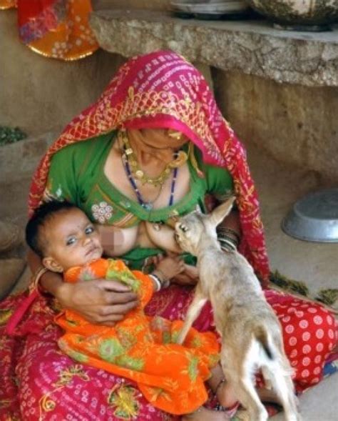 Woman Breastfeeding Puppies Ugandan Woman Forced To Breastfeed Dogs