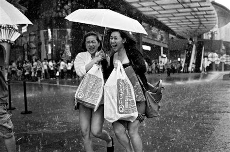 Water Soaked Candid Captures People In The Rain