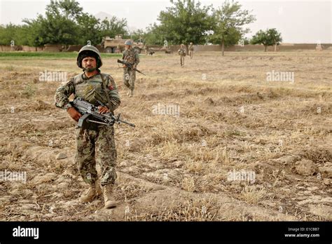 Afghan National Army Soldiers Conduct A Joint Patrol With Us Marines