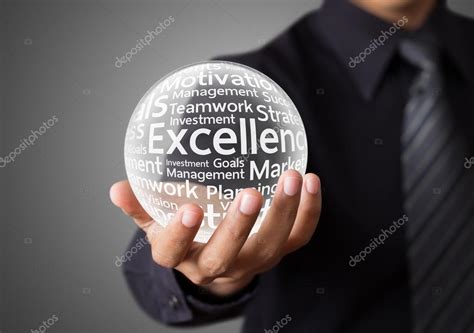 Businessman Hand Showing Excellence Word In Crystal Ball Stock Photo By