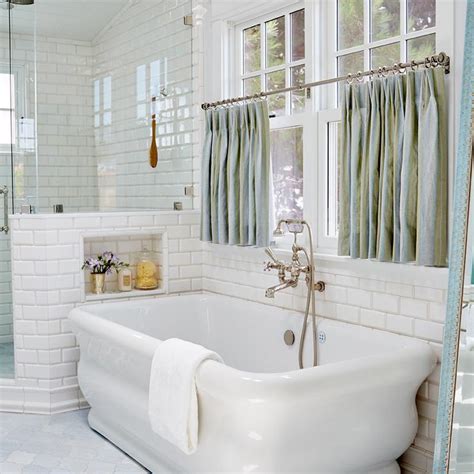 It is s o fun to begin a new day viewing some refreshing some ideas that are bathrooms with mirrors above bathtubs! Freestanding Tub Under Window Dressed in Blue Cafe ...