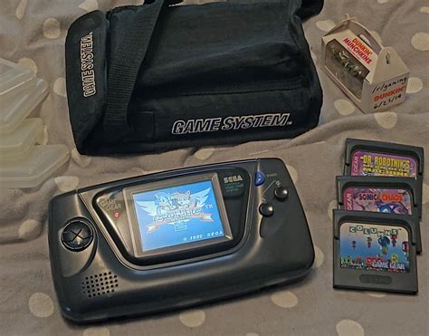 Literally A Picture Of An Old Sega Console And Some Games Now Give Me