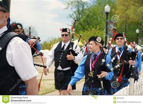 Female Bagpiper In Pipe And Drum Corps Editorial Image