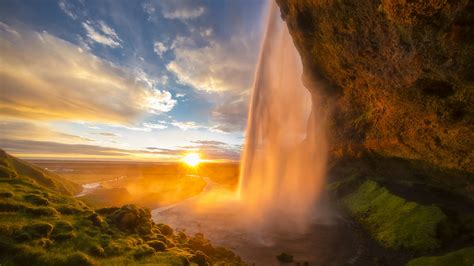 Waterfall From Rock During Sunrise Under Cloudy Blue Sky Hd Nature