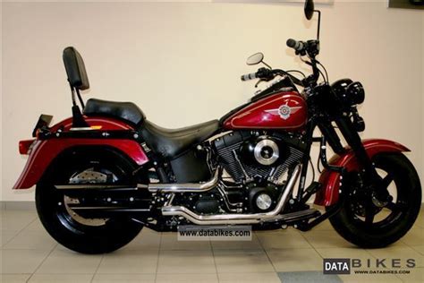 Has sissy bar with fold down luggage rack. 2004 Harley Davidson FATBOY FLSTF