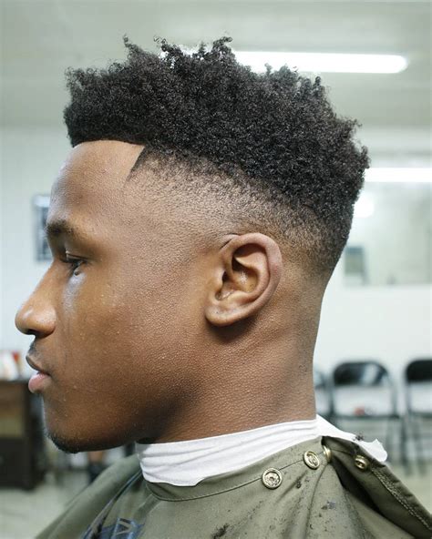 A neat style with some steps on the side. Black Boys Haircuts: 15 Trendy Hairstyles for Boys and Men