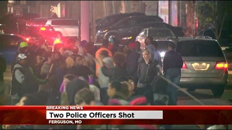 Two Police Officers Shot In Ferguson Mo As Dozens Celebrate Police Chief Resignation