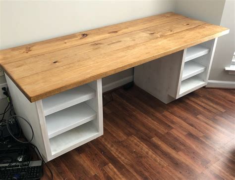 We built another 2×4′ frame for the tall cabinet, but couldn't do the same for the base cabinets as it would make them too tall for a desk. DIY Open Cabinet Desk » Famous Artisan