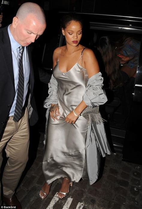 braless rihanna shows off her curves in silver satin dress daily mail online