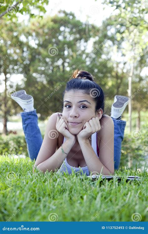 Jolly Beautiful Teenage Girl Sitting On Grass Stock Image Image Of