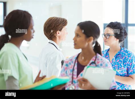 Doctor And Nurses Talking In Hospital Stock Photo Alamy