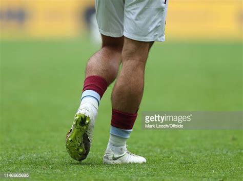 The Bulging Calf Muscles Of Jack Grealish Of Aston Villa During The