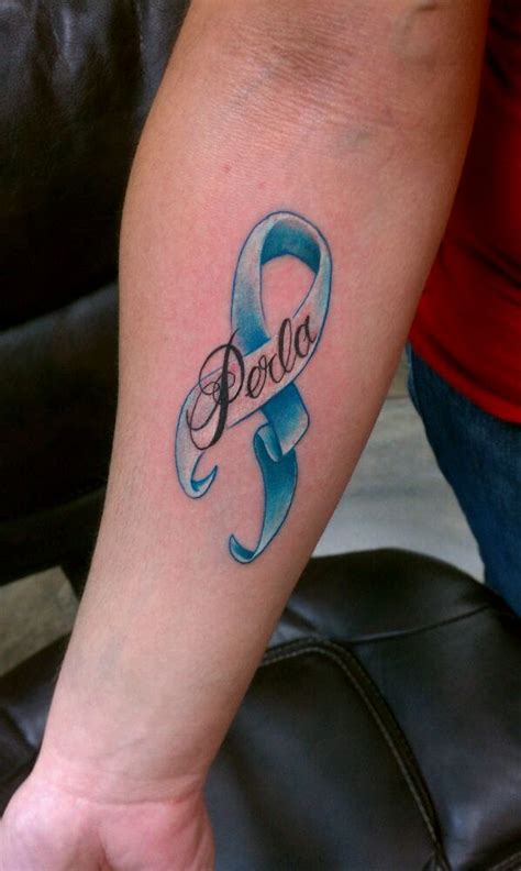 This cancer ribbon tattoo looks creative and has a got a spiritual touch in the form of little cross dangling i fought ovarian, uteran and breast cancer and recently added this tatoo for myself. Cervical Cancer ribbon, In memory of my sister. - Yelp