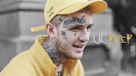 Lil Peep Is Wearing Yellow Dress And Cap Having Tattoos On Face And