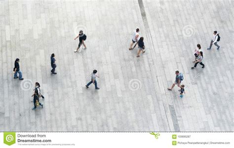 People Walk On Across Business City Street Aerial Top View Stock Image