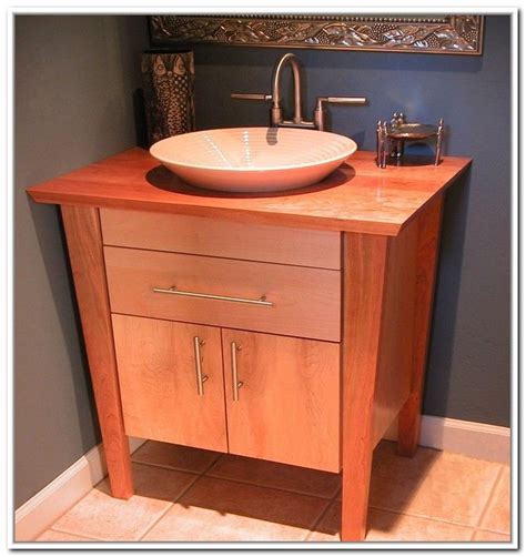 Fans of trough style sinks will appreciate this pedestal option on turned legs in a bathroom by vdal design collaborativei. Under Pedestal Sink Storage Bathroom | Home Design Ideas ...