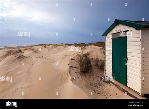 Neglected Beach Huts In Sand Dunes Stock Photo Alamy