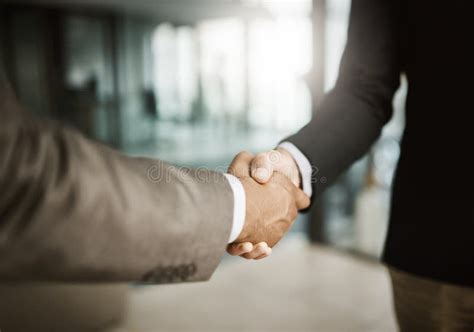 A Professional Handshake After An Interview Meeting For A Company In A