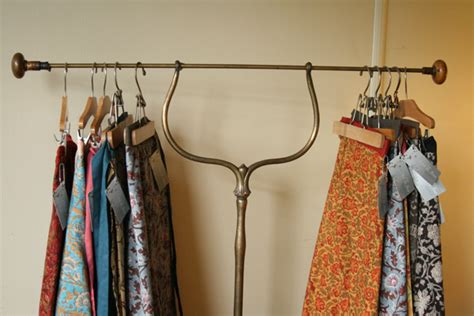 I used my miter saw to cut my pieces, but you can use a circular saw as well. ooh la jena: How to Build A Vintage Clothing Display for ...