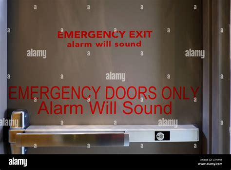 Inside Of An Emergency Exit Door Reading Emergency Exit Alarm Will