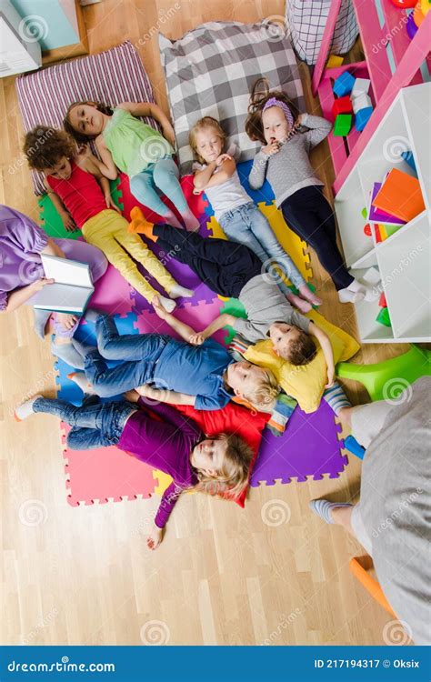 Happy Preschoolers After Nap Time At The Kindergarten Stock Image