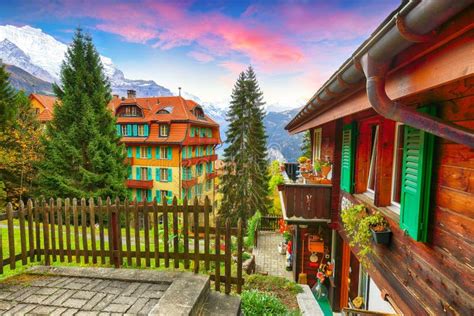 Fantastic Autumn View Of Traditional Swiss Chalets In Wengen Village