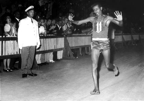 Abebe Bikila Crosses The Finish Line While Barefoot On Sept 11 1960