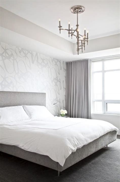 See more ideas about scandinavian bedroom, wallpaper bedroom, bedroom vintage. Modern silver gray bedroom with silver metallic wallpaper accent wall, gray linen modern bed ...