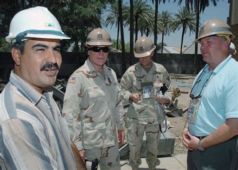An Iraqi Construction Contractor Talks With Us Army Corps Of Engineers