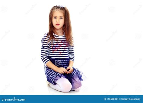 Little Girl Kneeling On The Floor Stock Photo Image Of Pretty Child