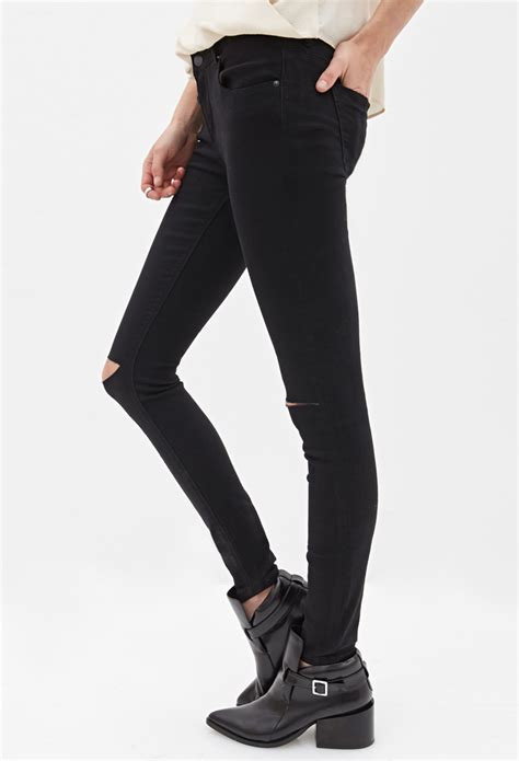 Lyst Forever 21 Ripped Skinny Jeans In Black