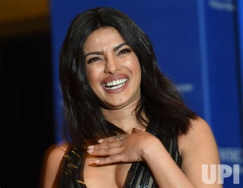Photo Actress Priyanka Chopra Laughs On The Red Carpet At The White
