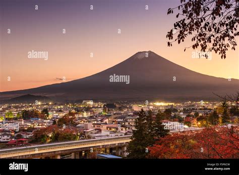 Mt Fuji Rises Over Fujiyoshida Japan In Autumn Stock Photo Alamy