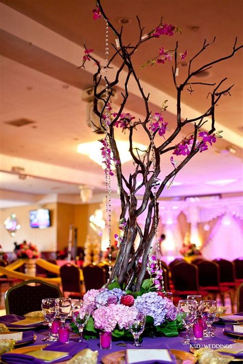 You can make this creative spring centerpiece for next to nothing. Manzanita Tree Centerpiece - get orchids and hydrangeas | Diy wedding centerpieces branches ...